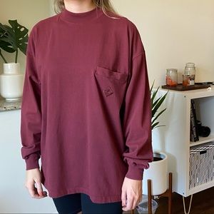 Red Timberland sweater.